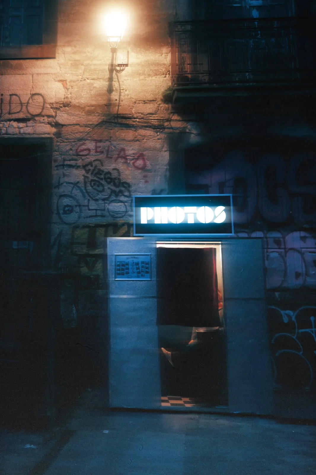 Retromat on a city street at night